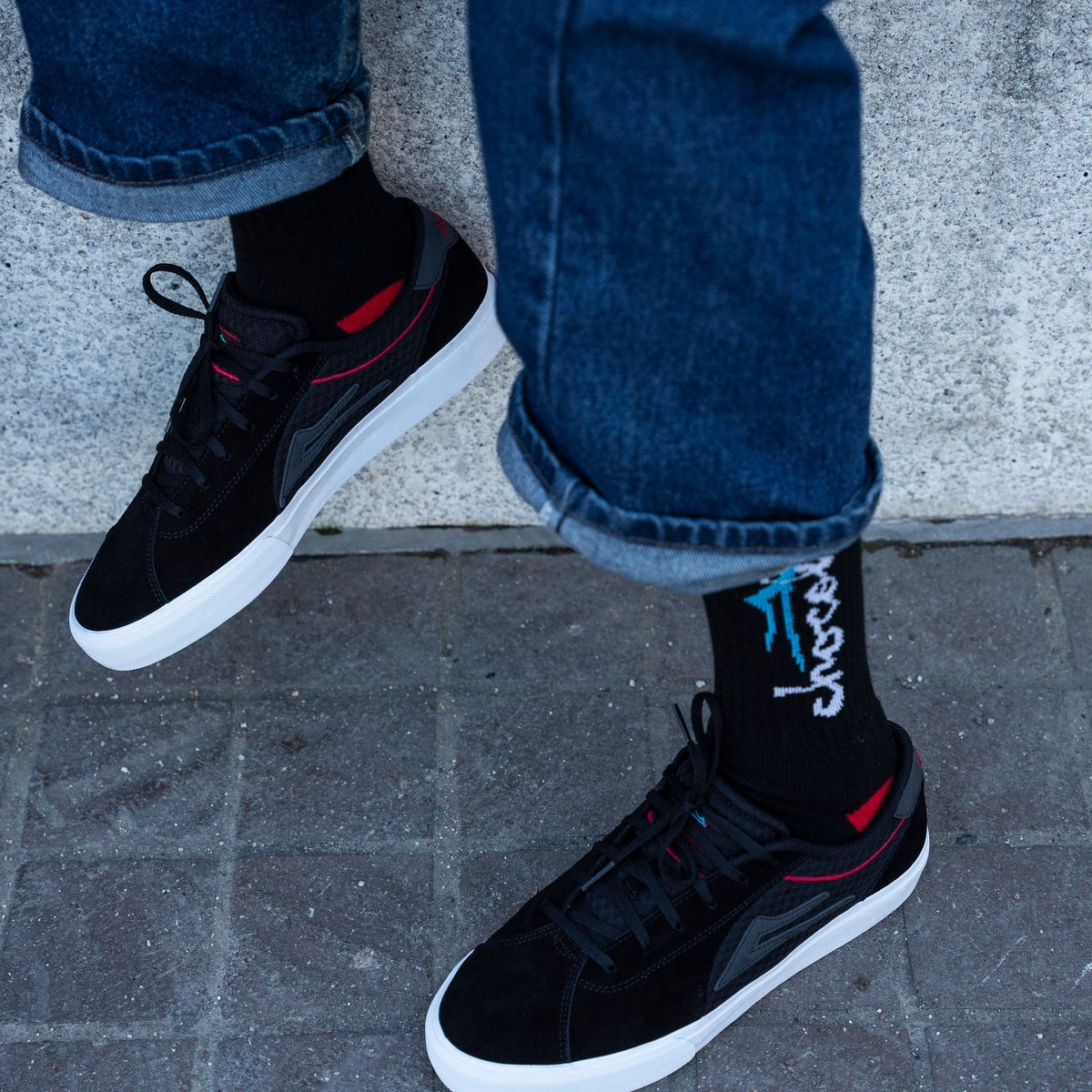 LAKAI X CHOCOLATE FLACO 2 BLACK RED SUEDE TRAINERS