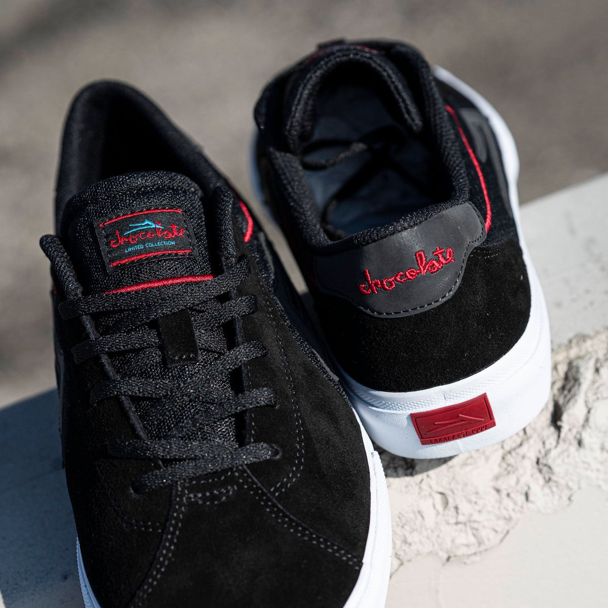 LAKAI X CHOCOLATE FLACO 2 BLACK RED SUEDE TRAINERS